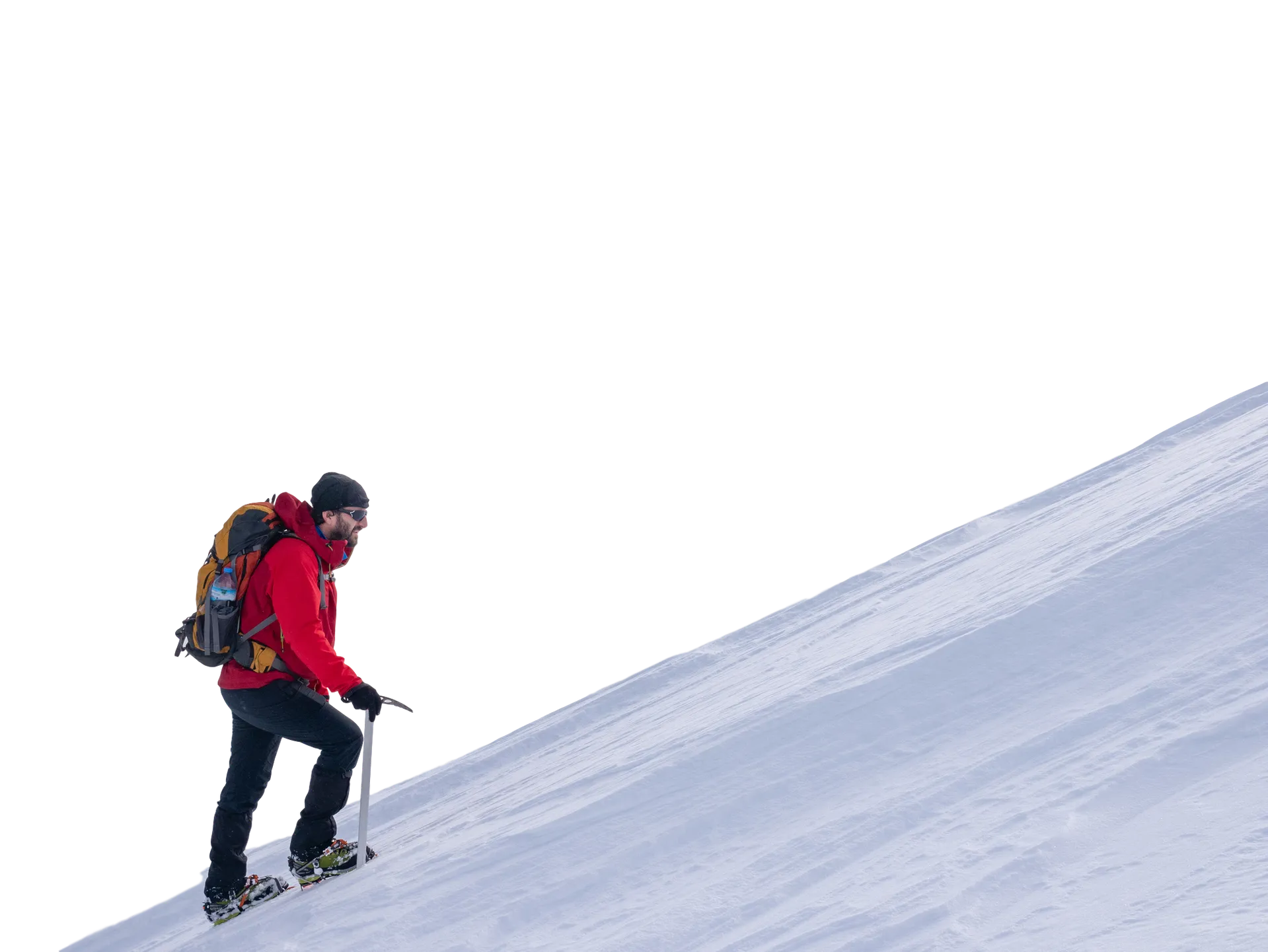 mountaineer hiking up a steep snow covered slope