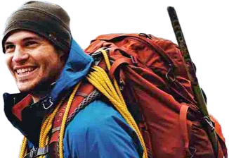 mountain guide smiling with a red backpack and ice axe