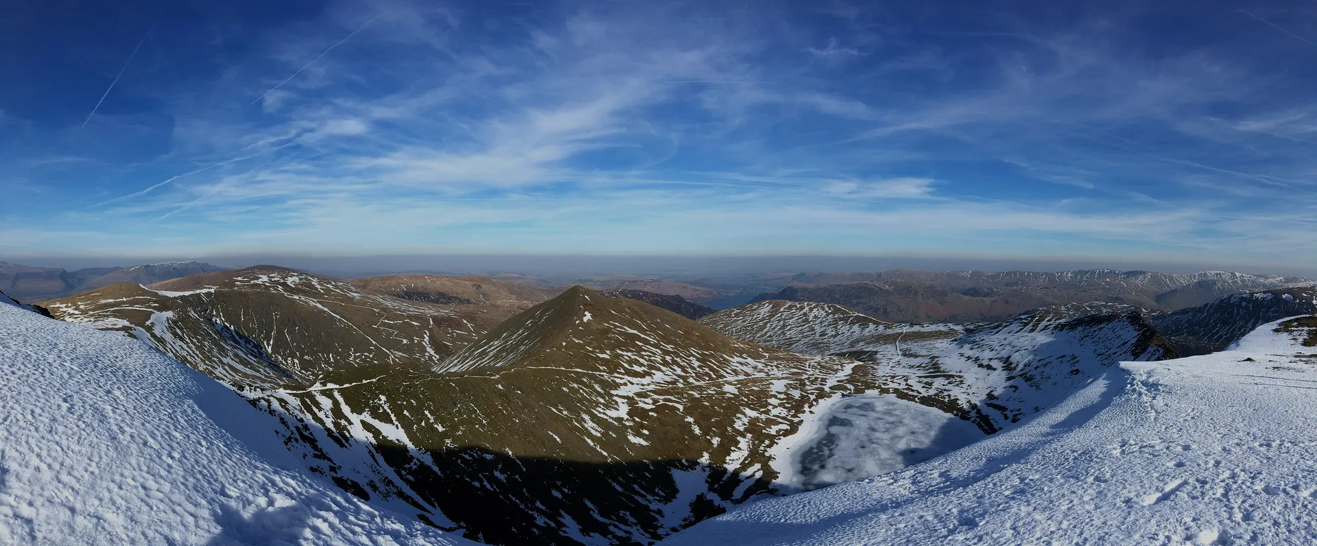 panoramic picture of a snow covered hills